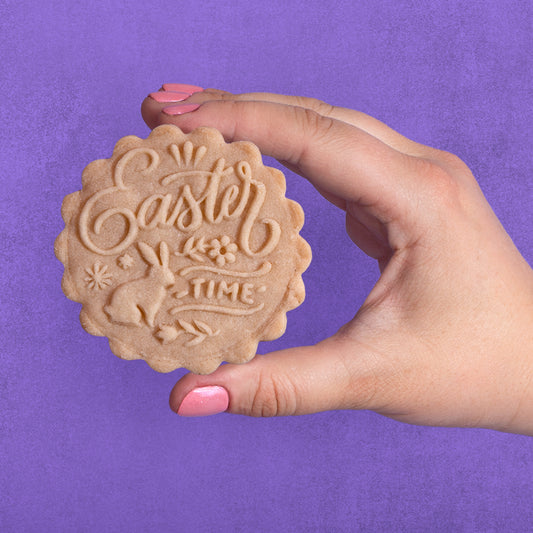Embossed sugar cookie that says Easter Time
