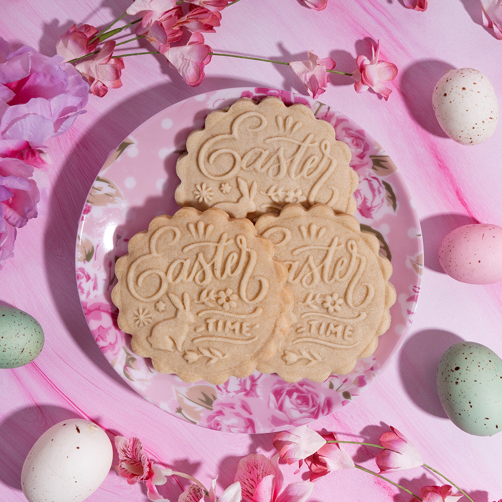 A plate of Easter themed embossed sugar cookies.