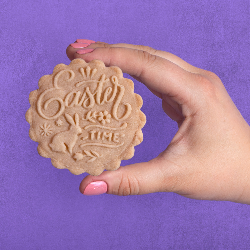 Embossed sugar cookie that says Easter Time